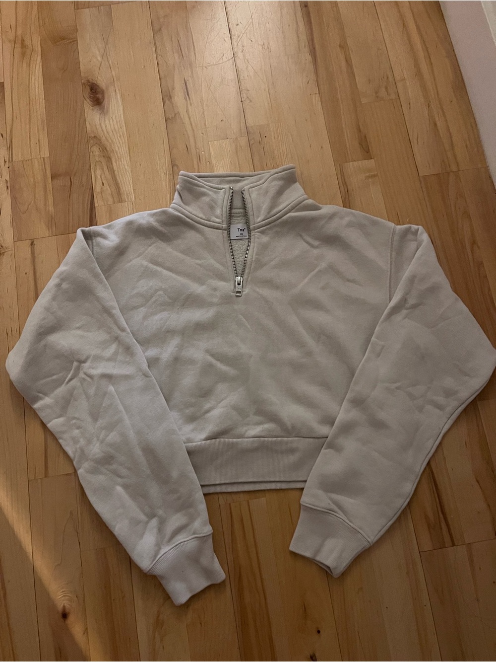 TNA Cropped Quarter-Zip Sweatshirt in off white